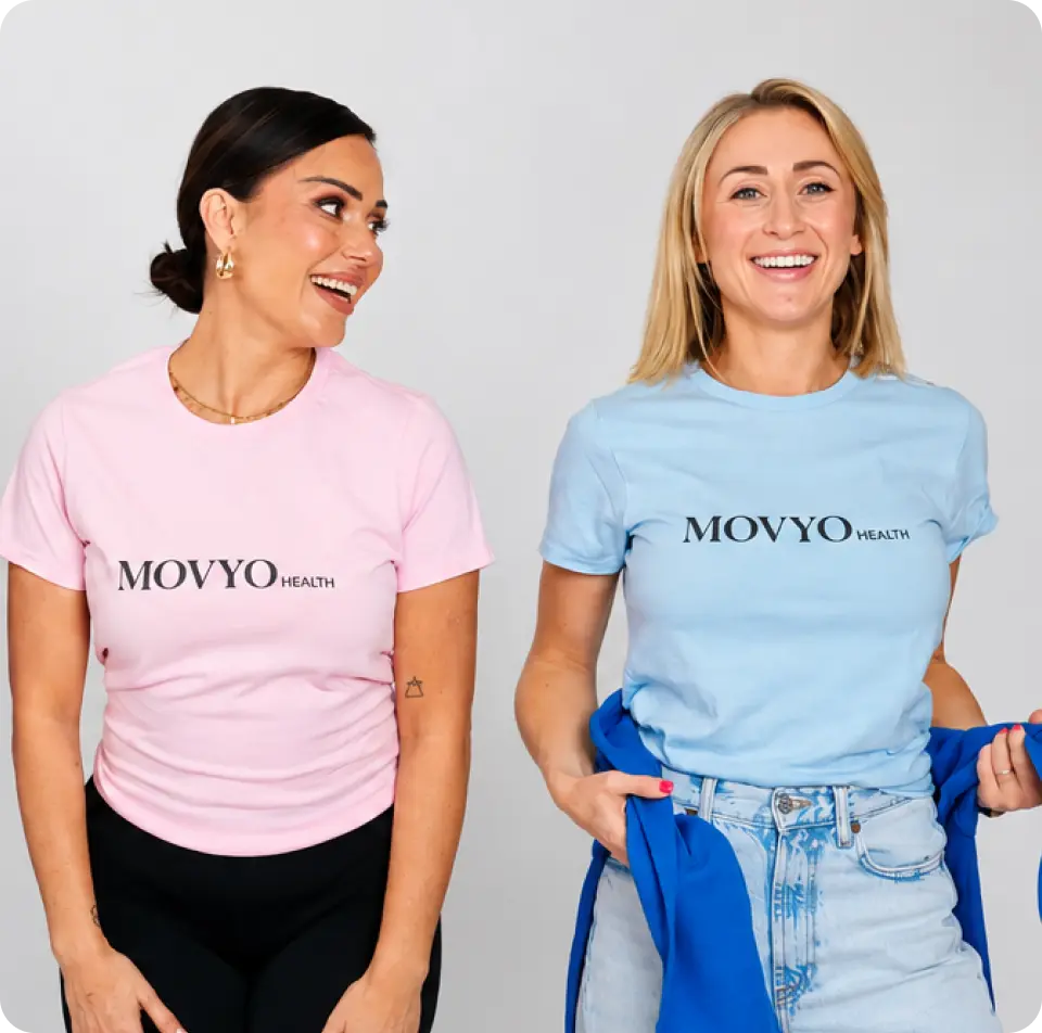 Three Movyo Health community members smiling in branded t-shirts